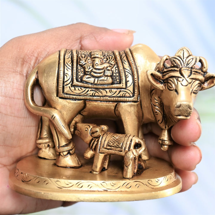 Brass cow calf statue show pieces home decor kamdhenu cow with calf idol vastu pooja small