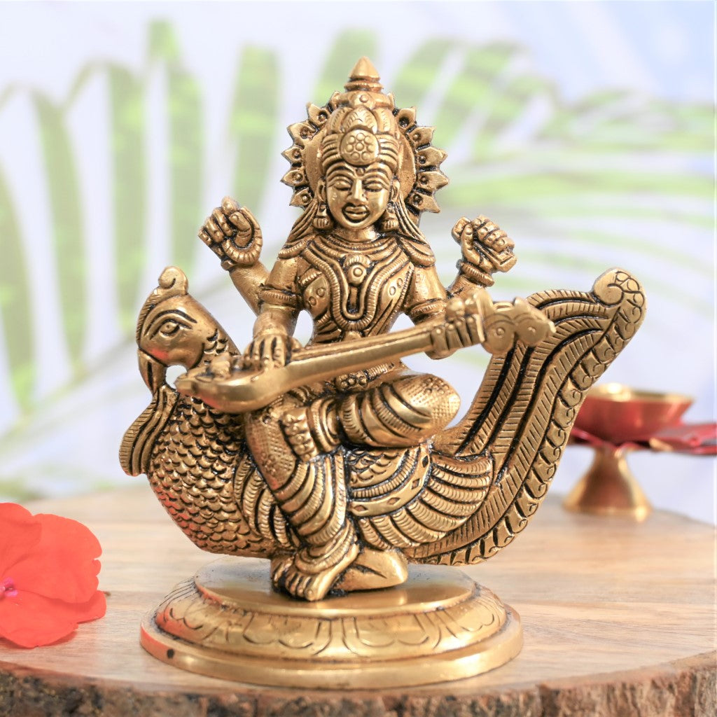 Brass saraswati idol with peacock veena small for pooja saraswati murti pital home decor gift