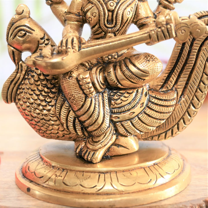 Brass saraswati idol with peacock veena small for pooja saraswati murti pital home decor gift