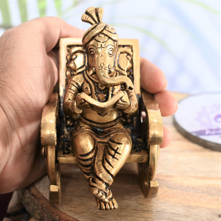 Lord ganesha rocking chair brass chair ganesha idol ganesh statue reading book study table small